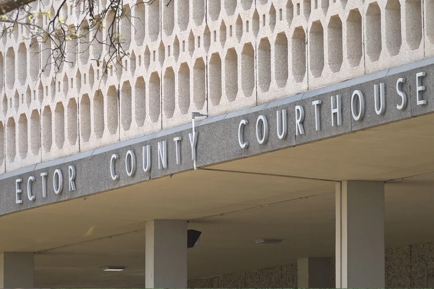 Close-up of the Ector County Courthouse sign, representing property tax protest services in Odessa, Texas, by Tax Cutter. 