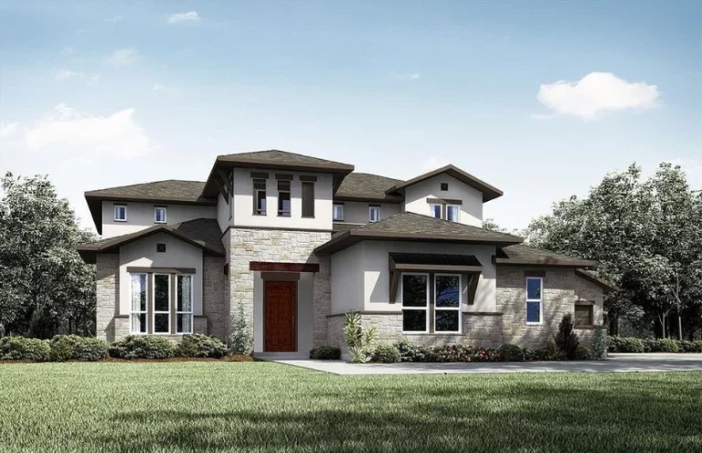 Modern two-story home with a stone and stucco exterior, large windows, landscaped yard, and a spacious lawn under a clear sky.